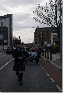 Lone Piper leads procession