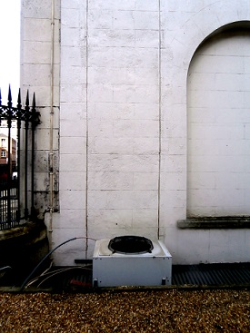 The rear of City Hall where the British blew a section of wall out to attack the building. The damage is still visible.