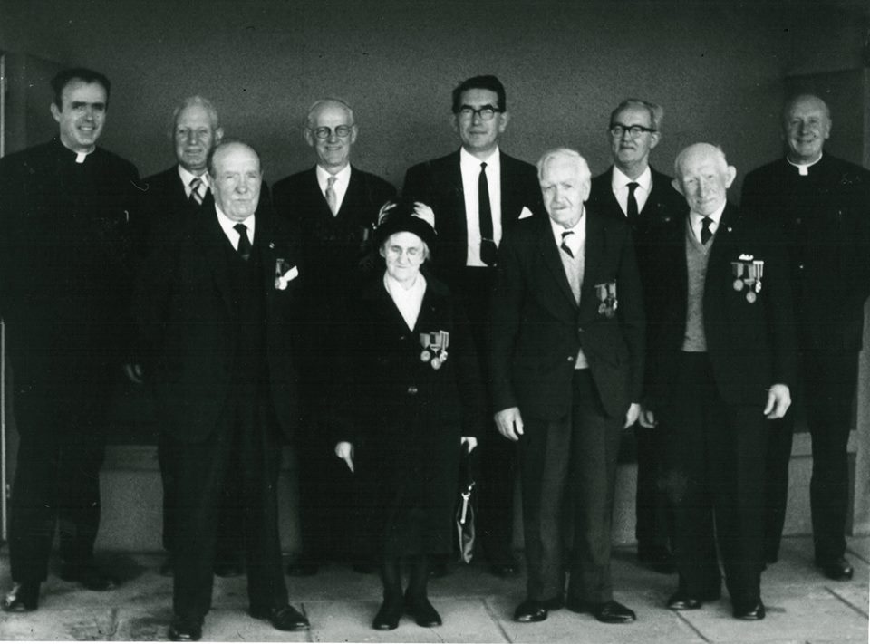 on the 50th anniversary of the Rising , Christy with  other ICA veterns . He is third from left , standing behind Rosie Hackett. 